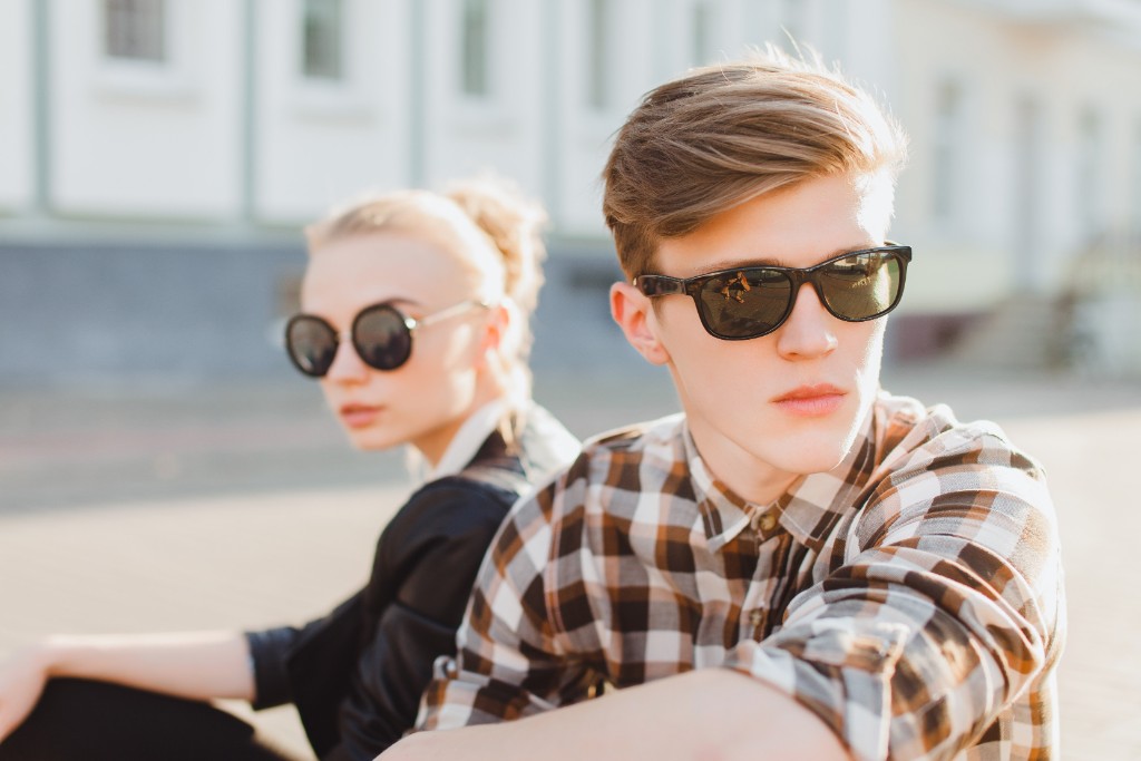 Couple Poses Wearing Black Glasses