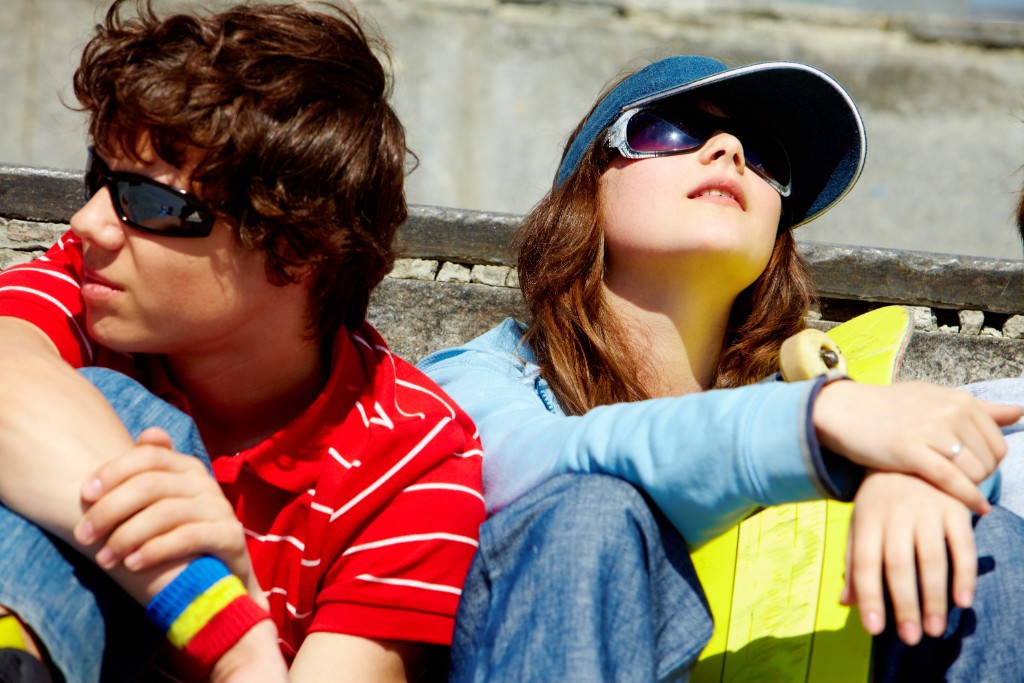 Couple Poses Wearing Black Glasses